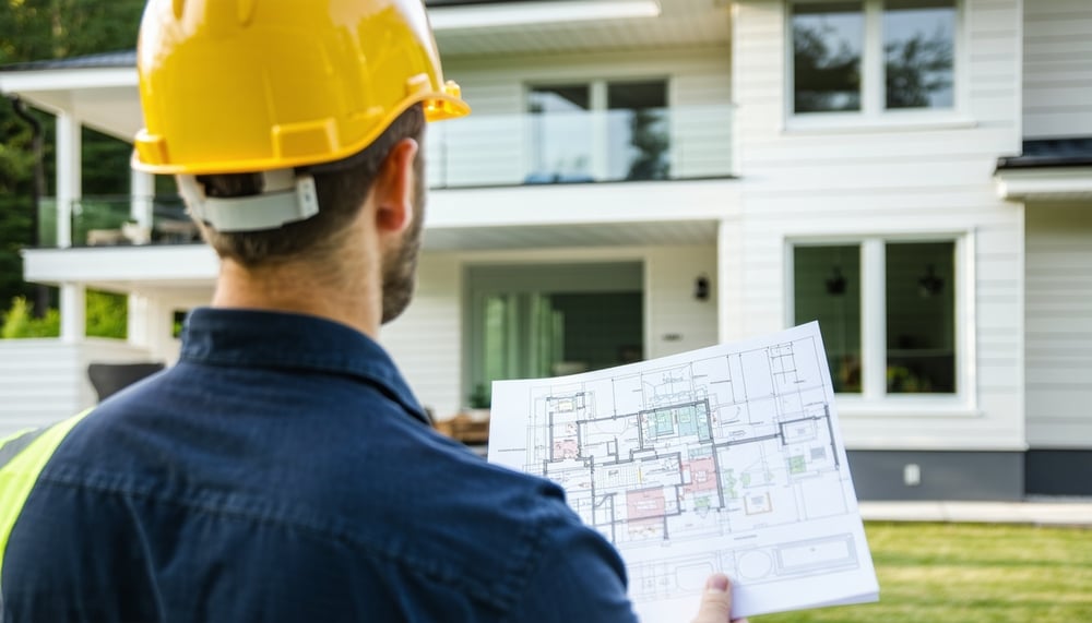 Licensed contractor inspecting a home Licensed contractor inspecting a home